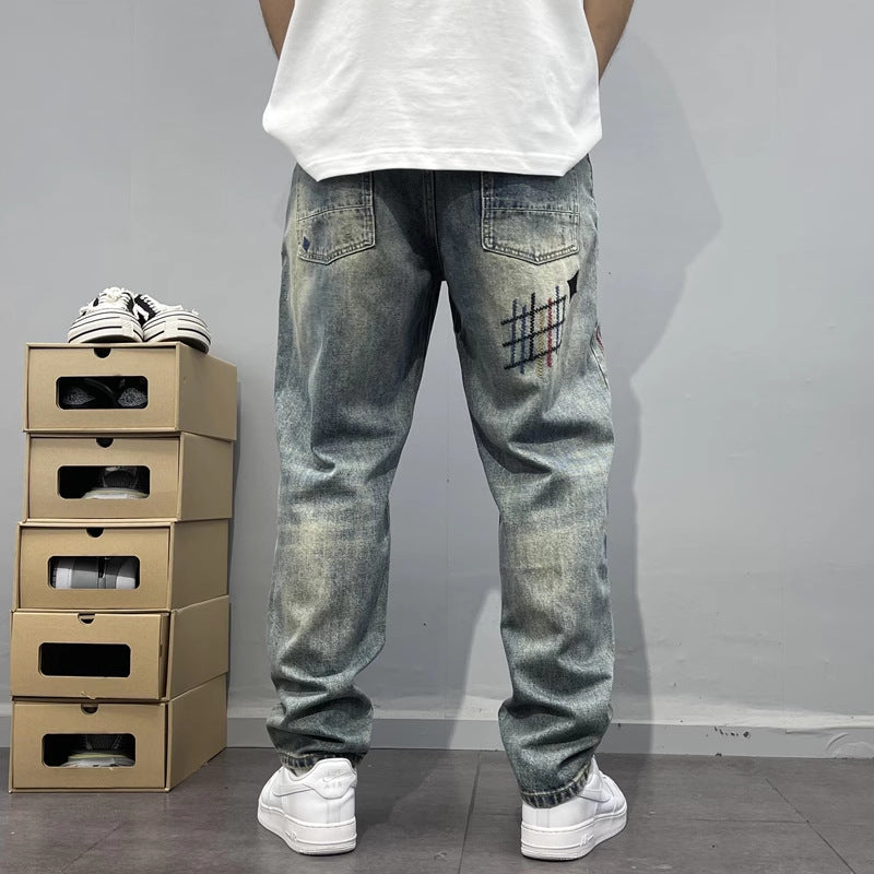 Heavy-washed, scratched-off denim men, handsome trendy patches, high-end embroidery prints, loose tapered straight-leg jeans