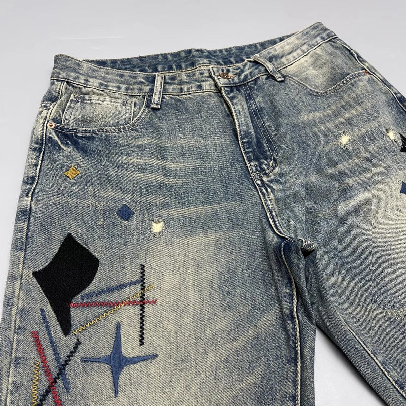 Heavy-washed, scratched-off denim men, handsome trendy patches, high-end embroidery prints, loose tapered straight-leg jeans