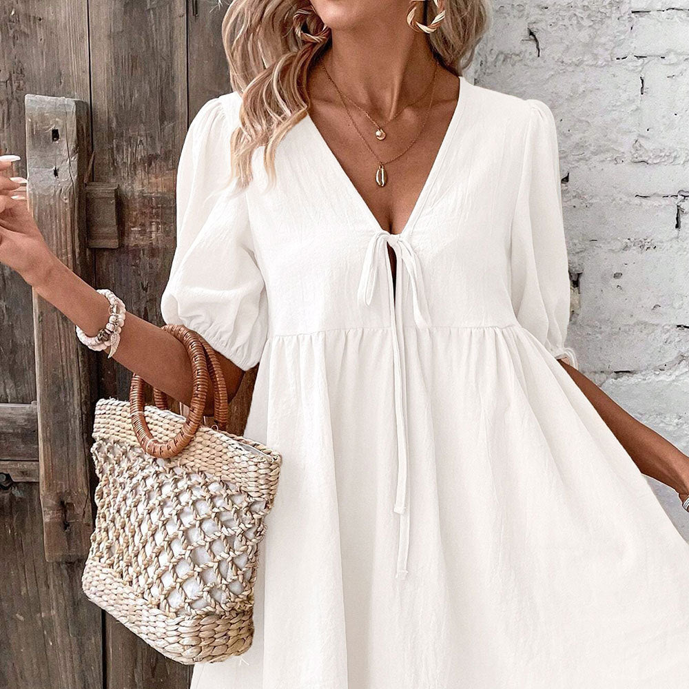 2026 European and American cross-border elegant loose woven deep V-neck design sense chest lace-up A-swing dress