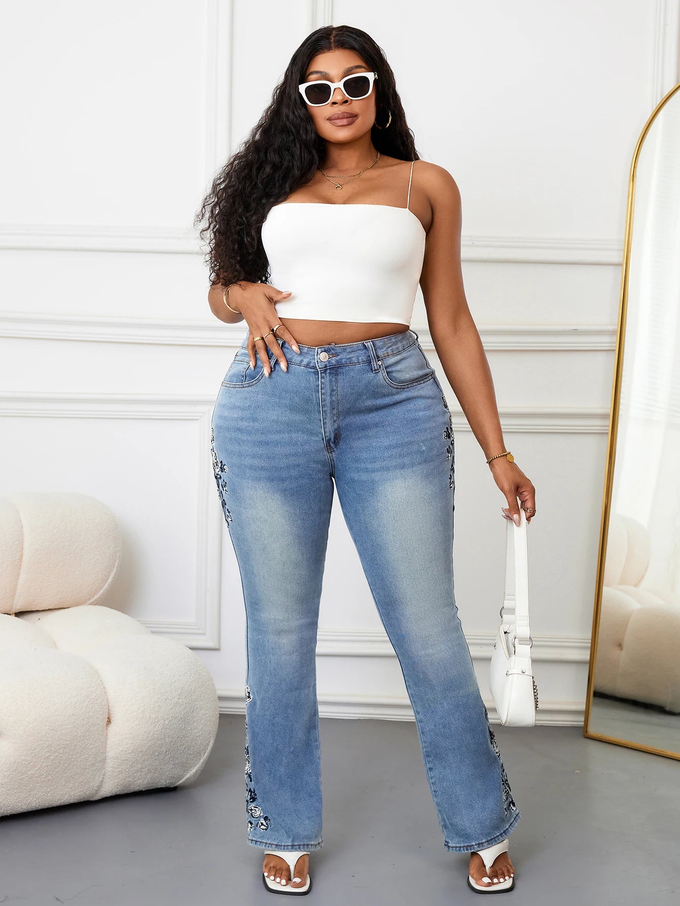 Plus Size Fashion Flared Leg Denim Jeans for Women High Waist Distressed Blue Wash Embroidered Details Street Style Curvy Pants